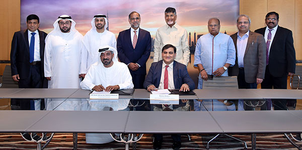 His Highness Sheikh Ahmed Bin Saeed Al Maktoum, Chairman and Chief Executive Emirates Airline & Group, and Krishna Kishore, CEO, Andhra Pradesh Economic Development Board (APEDB), signing the MoU in the presence of representatives from both parties.