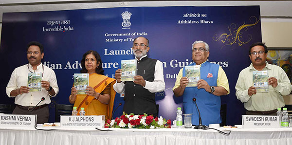 The Minister of State for Tourism (I/C), Shri Alphons Kannanthanam launching the Indian Adventure Tourism Guidelines, at a function, in New Delhi. The Secretary, Ministry of Tourism, Smt. Rashmi Verma, The Joint Secretary, Ministry of Tourism,  Shri Suman Billa (IAS), ATOAI President, Shri. Swadesh Kumar and other dignitaries are also seen.