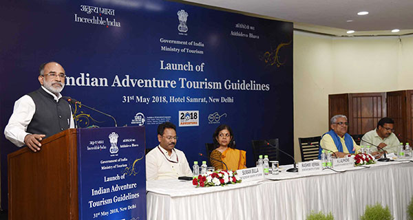 The Minister of State for Tourism (I/C), Shri Alphons Kannanthanam addressing at the launch of the Indian Adventure Tourism Guidelines, in New Delhi. The Joint Secretary, Ministry of Tourism,  Shri Suman Billa (IAS), The Secretary, Ministry of Tourism, Smt. Rashmi Verma, ATOAI President, Shri. Swadesh Kumar and other dignitaries are also seen.