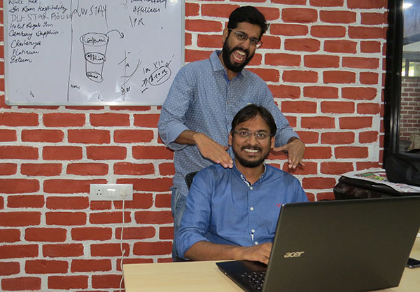 Founders of Luvstay, Karan Mago (standing) & Sumit Anand (sitting)