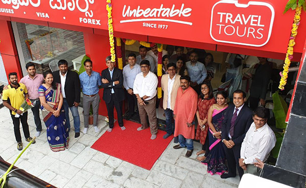 Rakshit Desai, Managing Director, India at Flight Centre Travel Group with Travel Tours Team at newly inaugurated retail store at Bengaluru