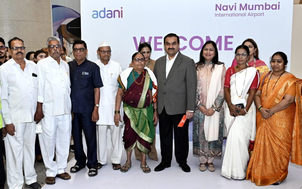 Chairman Gautam Adani Welcomes First Passengers as Navi Mumbai International Airport Takes Flight